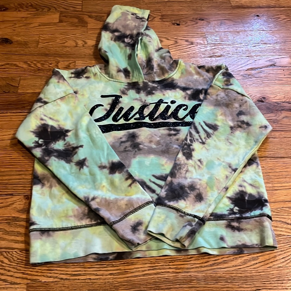 I'm selling a black and green justice hoodie it's a size L 12/14
